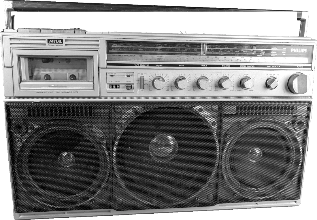 Matt's own vintage silver boombox with a cassette deck, radio dial and three big speakers